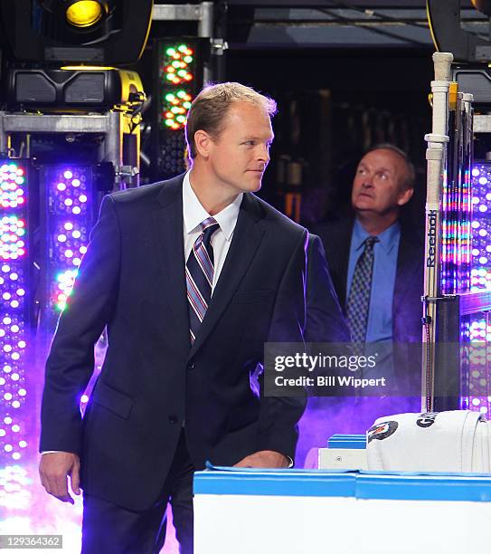 Assistant coach Kevyn Adams of the Buffalo Sabres is introduced before their game against the Carolina Hurricanes at First Niagara Center on October...