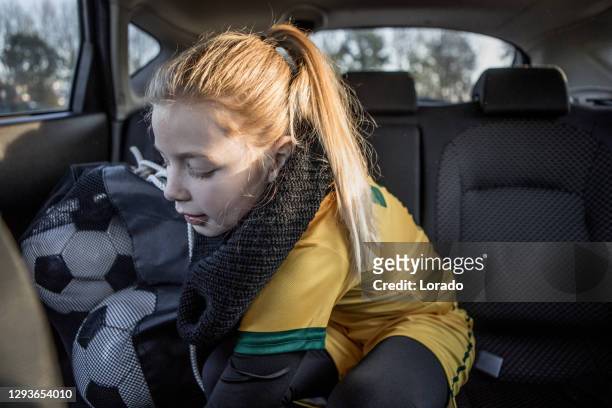 soccer girl driving to football training - daughter driving stock pictures, royalty-free photos & images