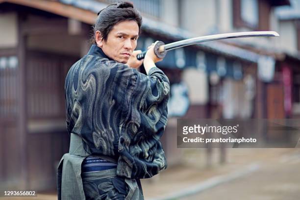 portrait of samurai - samurai sword stock pictures, royalty-free photos & images
