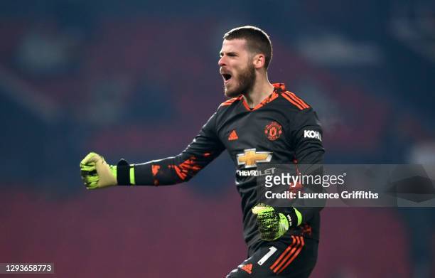 David De Gea of Manchester United celebrates after his team's first goal scored by teammate Marcus Rashford during the Premier League match between...
