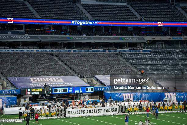 General view of the Pittsburgh Steelers holding an anti-racism banner during the national anthem ahead of a regular season game against the New York...