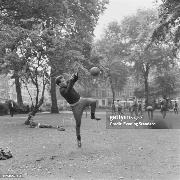 Israeli footballer Haim Levin of Maccabi Tel Aviv, in a London park, UK, August 1966.