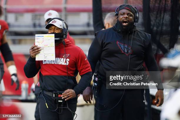 Defensive coordinator Vance Joseph and line coach Brentson Buckner of the Arizona Cardinals reacts during the NFL game against the Philadelphia...