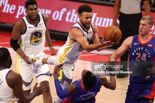 Stephen Curry of the Golden State Warriors tries to get to the basket past Josh Jackson of the Detroit Pistons during the first half at Little...