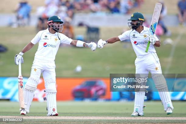 Fawad Alam and Mohammad Rizwan of Pakistan during day five of the First Test match in the series between New Zealand and Pakistan at Bay Oval on...