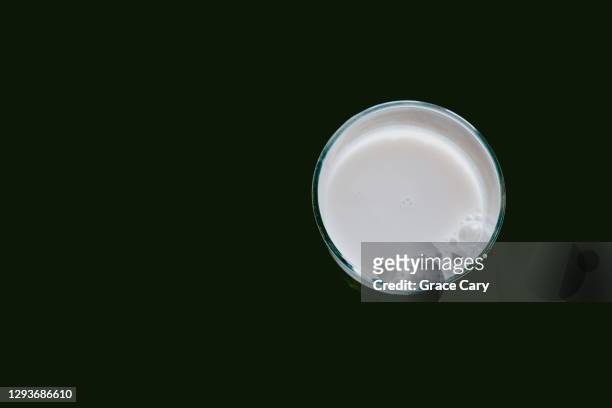 glass of milk - almond milk stock pictures, royalty-free photos & images