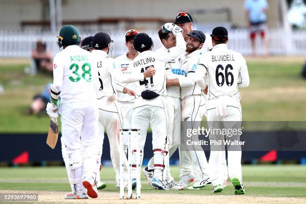 Mitchell Santner and New Zealand celebrate the wicket of Mohammad Abbas of Pakistan during day five of the First Test match in the series between New...