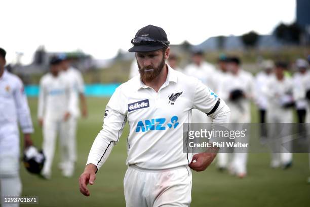 New Zealand captain and man of the match Kane Williamson leaves the field following day five of the First Test match in the series between New...