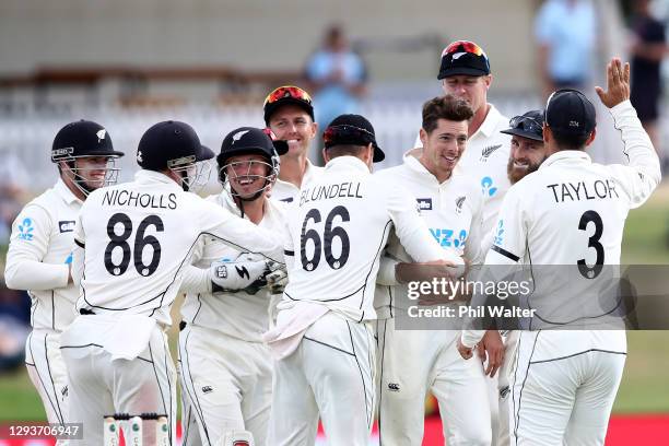 Mitchell Santner and New Zealand celebrate the wicket of Mohammad Abbas of Pakistan during day five of the First Test match in the series between New...