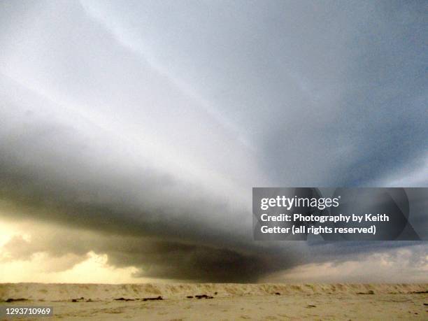 storm landscape at the beach - hurricane symbol stock pictures, royalty-free photos & images