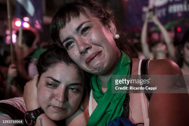 Pro-choice demonstrator weeps excited after the right to an abortion is legalized on December 29, 2020 in Buenos Aires, Argentina. The proposal...