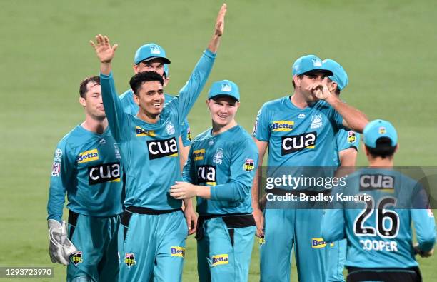Mujeeb Ur Rahman of the Heat celebrates taking the wicket of Scott Bolland of the Hurricanes during the Big Bash League match between the Hobart...