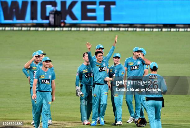 Mujeeb Ur Rahman of the Heat celebrates taking the wicket of Scott Bolland of the Hurricanes during the Big Bash League match between the Hobart...