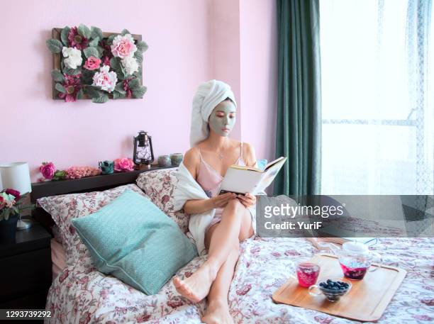 woman with facial mask - body care and beauty stock pictures, royalty-free photos & images