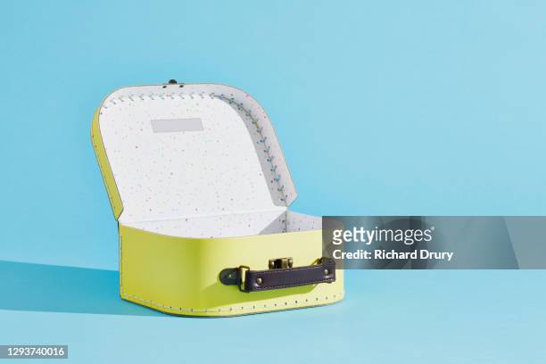 an empty, open suitcase - suitcase stock pictures, royalty-free photos & images
