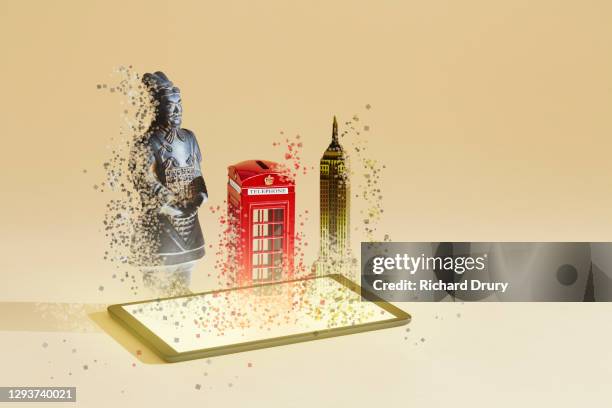 pixelated travel souvenirs emerging from a digital tablet - appearance icon stock pictures, royalty-free photos & images