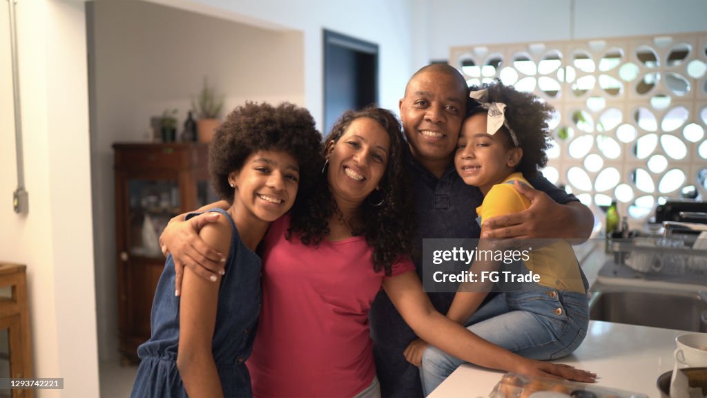 Portrait of a happy family together at home