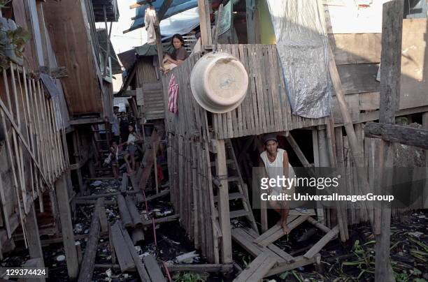 Slums, Philippines, Cebu City,These Families Are Too Poor To Buy Homes Inland With Access To Clean Water, They are forced to build makeshift houses...