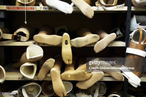 Rows of prosthetic feet, used as templates to create new limbs