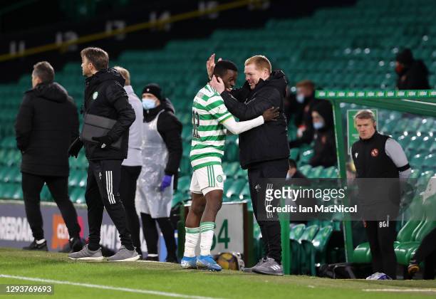 Neil Lennon, Manager of Celtic congratulates Ismaila Soro after he is substituted during the Ladbrokes Scottish Premiership match between Celtic and...