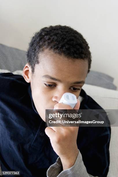Child Using Puffer Inhalers For Asthma Photos and Premium High Res Pictures - Getty Images