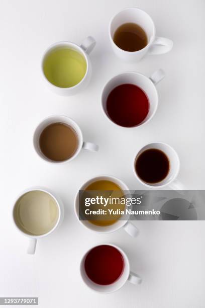 set of cups with tea. different types of tea. - white tea stock pictures, royalty-free photos & images