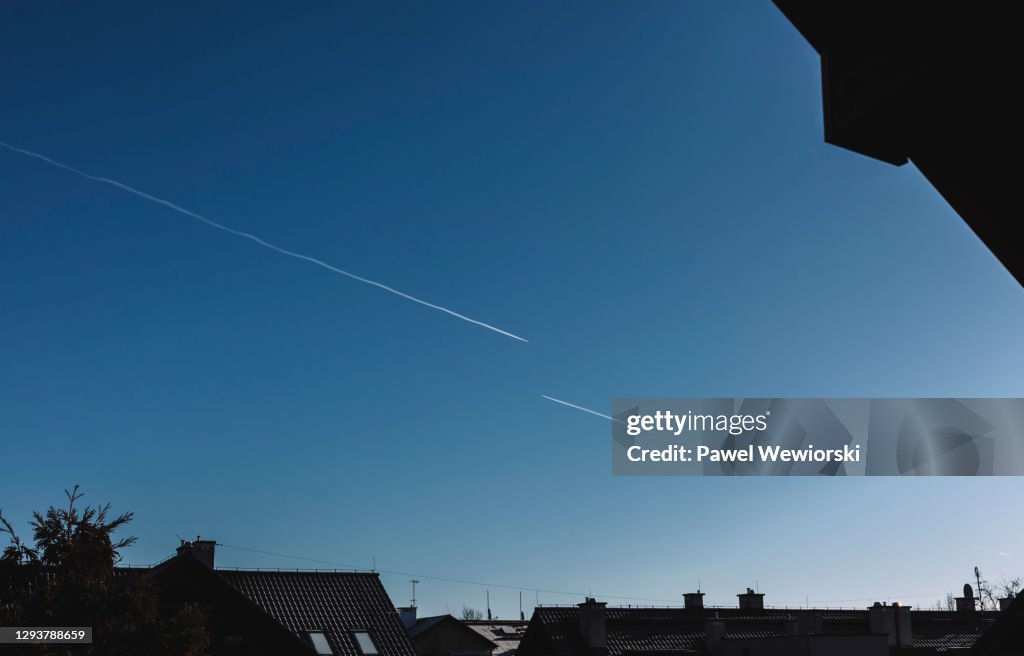 Two vapor trials on sky