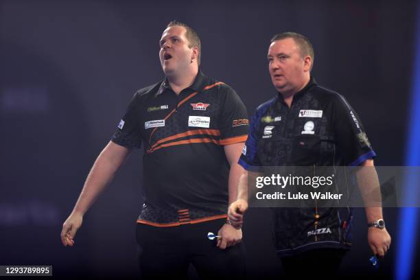 Dirk van Duijvenbode of The Netherlands reacts during his fourth round match against Glen Durrant of England during Day Thirteen of the PDC William...