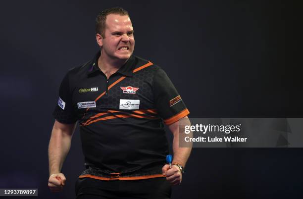 Dirk van Duijvenbode of The Netherlands reacts during his fourth round match against Glen Durrant of England during Day Thirteen of the PDC William...