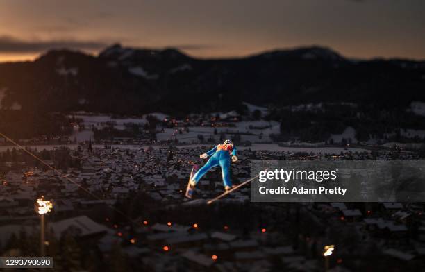 Antti Aalto of Finland flies over the town of Oberstdorf during his first competition jump at the Four Hills Tournament 2020 Oberstdorf on December...