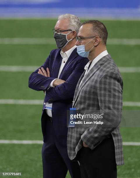 Detroit Lions President and CEO Rod Wood talks with Chris Spielman prior to the start of the game against the Tampa Bay Buccaneers at Ford Field on...