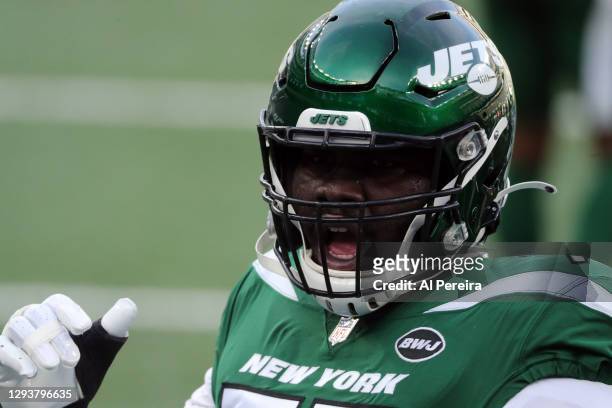 Mekhi Becton of the New York Jets follows the action against the Cleveland Browns at MetLife Stadium on December 27, 2020 in East Rutherford, New...