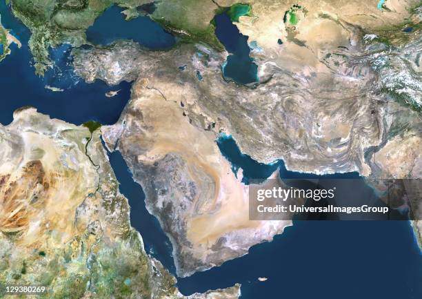 Middle East, true colour satellite image. North is at top. Vegetation is green, water is dark blue and bare ground, mostly desert, is yellow-brown....