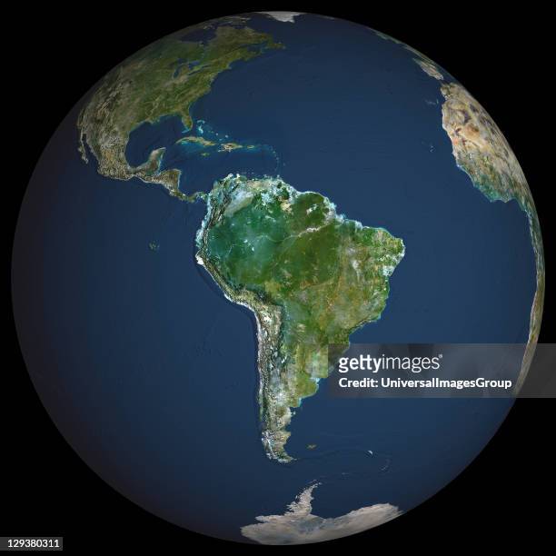 Earth. True colour satellite image of the Earth, centred on South America. North is at top. Water is blue, vegetation is green, arid areas are brown,...