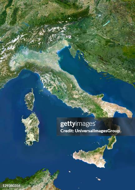 Italy, true colour satellite image. Italy comprises the large peninsula at centre, and the large islands of Sicily and Sardinia . It also encompasses...