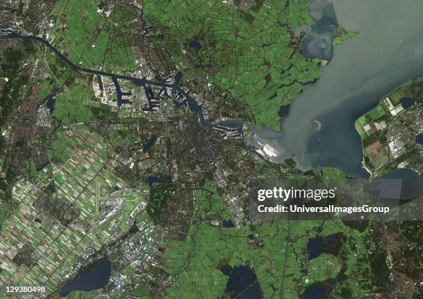 Amsterdam, Netherlands. True colour satellite image of Amsterdam, the capital city of the Netherlands. Image taken on 18 October 1999 using LANDSAT 7...