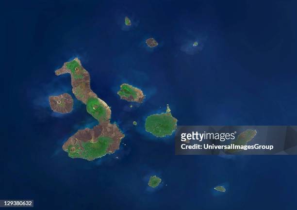 True colour satellite image of the Galapagos islands, province of Ecuador, located in the Pacific Ocean, more than 1000 km from the coast. Five major...