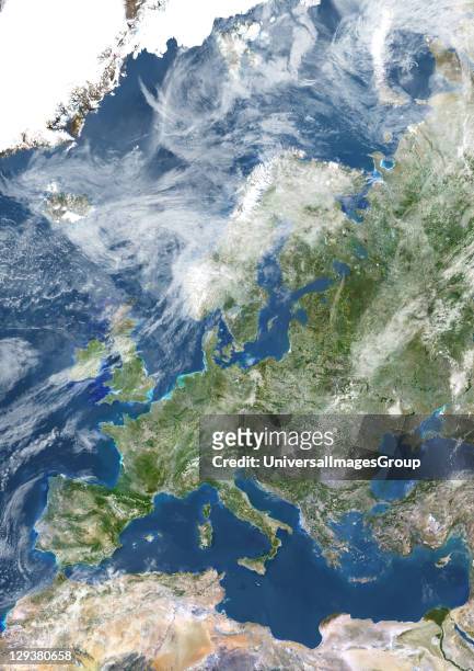True colour satellite image of Europe with cloud coverage. This image in Lambert Conformal Conic projection was compiled from data acquired by...