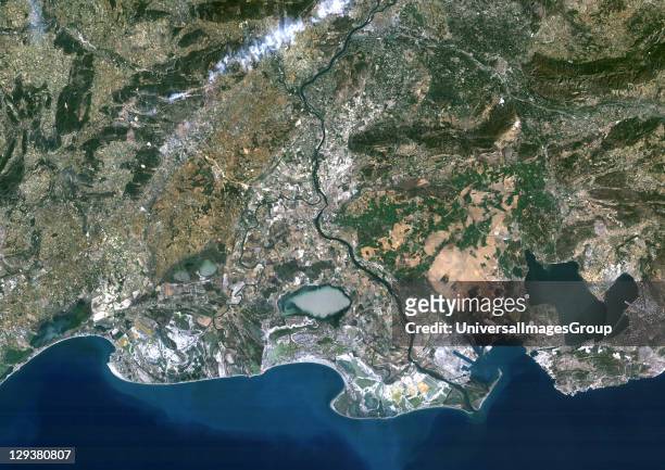Rhone river and Camargue, France, true colour satellite image. Camargue is the land between the Mediterranean Sea and the two arms of the River Rhone...