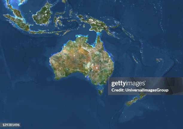True colour satellite image of Oceania. This image in Lambert Conformal Conic projection was compiled from data acquired by LANDSAT 5 & 7...