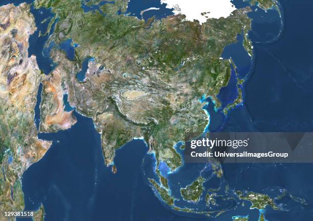 True colour satellite image of Asia. This image in Lambert Azimuthal Equal Area projection was compiled from data acquired by LANDSAT 5 & 7...
