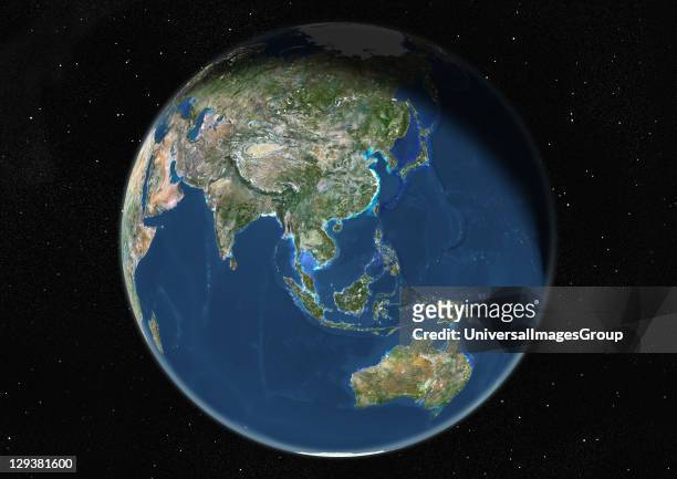 True colour satellite image of the Earth centred on Asia and Oceania, during winter solstice at 6 a.m GMT. This image in orthographic projection was...
