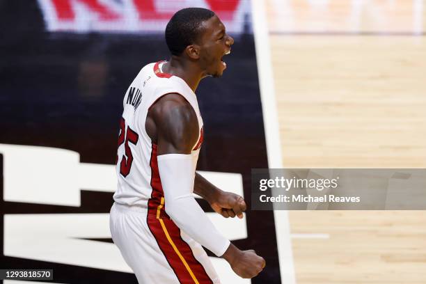 Kendrick Nunn of the Miami Heat reacts to a dunk against the Milwaukee Bucks during the first quarter at American Airlines Arena on December 30, 2020...