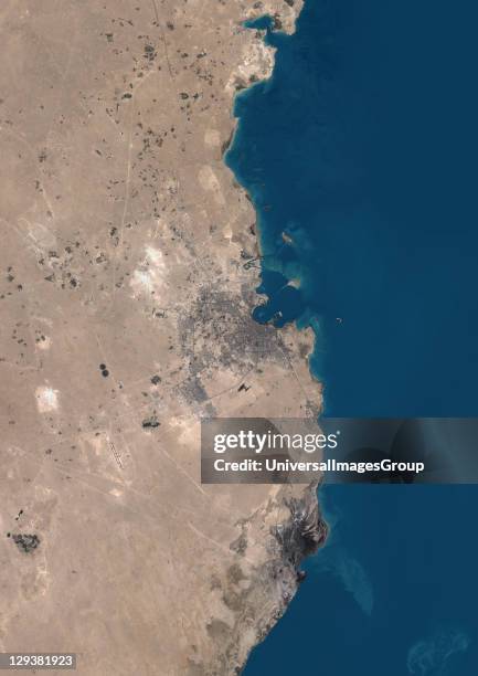 True colour satellite image of Doha, the capital city of Qatar, located on the Persian Gulf. Image taken in August 2001, using LANDSAT 7 data., Doha,...