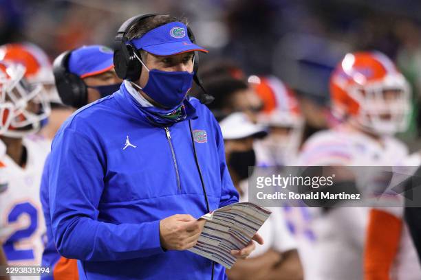 Head coach Dan Mullen of the Florida Gators looks on against the Oklahoma Sooners during the third quarter at AT&T Stadium on December 30, 2020 in...