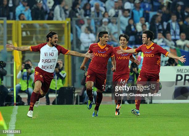 Pablo Daniel Osvaldo of Roma celebrates after scoring the opening goal during the Serie A match between SS Lazio and AS Roma at Stadio Olimpico on...