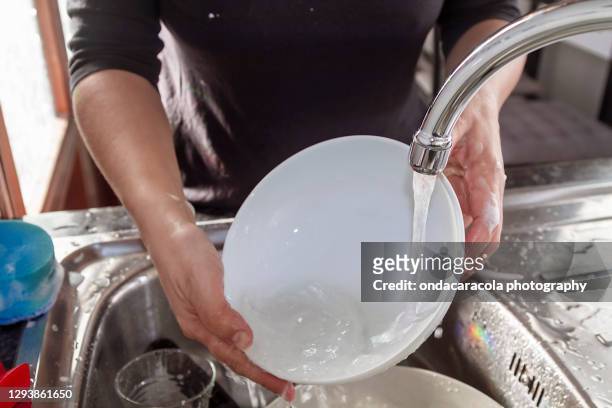 washing home dishes - wash the dishes stock pictures, royalty-free photos & images