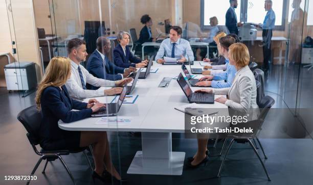 corporate board meeting - formal businesswear stock pictures, royalty-free photos & images