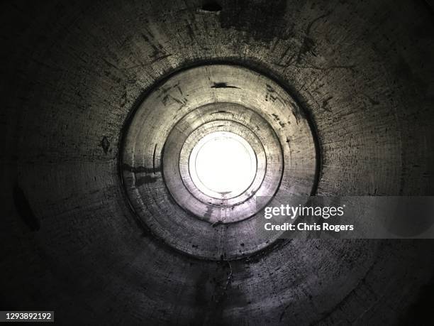 culverts and storm drains - canalisation stock-fotos und bilder