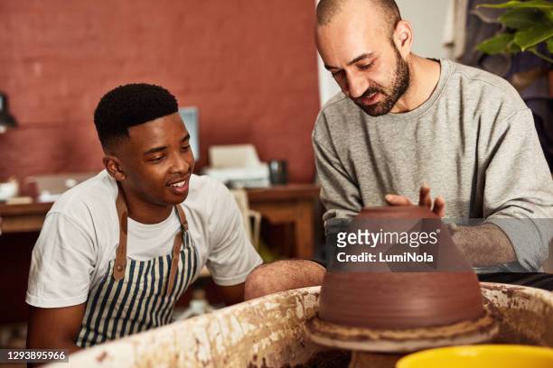 a playground for pottery enthusiasts - spin instructor stock pictures, royalty-free photos & images